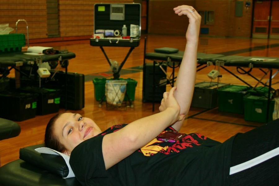 Junior Zoe Moon-Smith lies down after donating blood. 