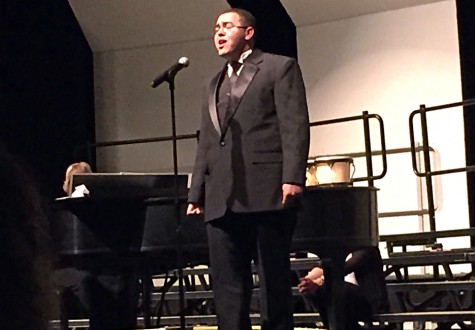 Senior Zack Broughton sings "Merry Christmas, Darling."