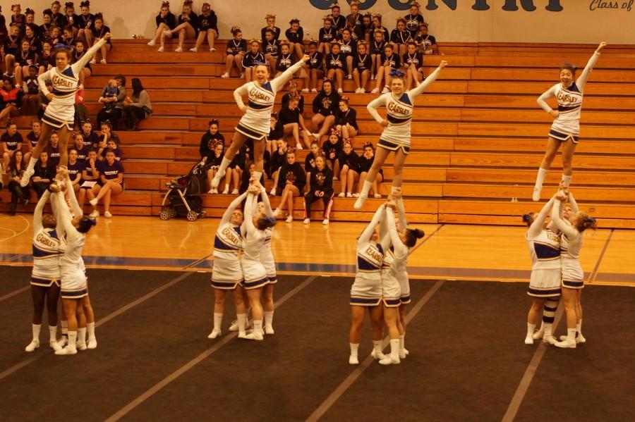 Flyers hit a stunt in round three at the district competition on Feb. 20.