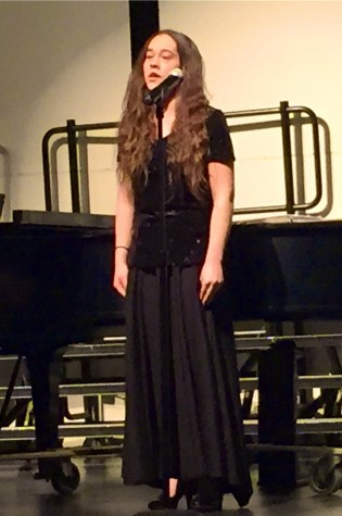 Junior Leslie Brissette sings "When I First Sang My Song" by Ernest Charles.