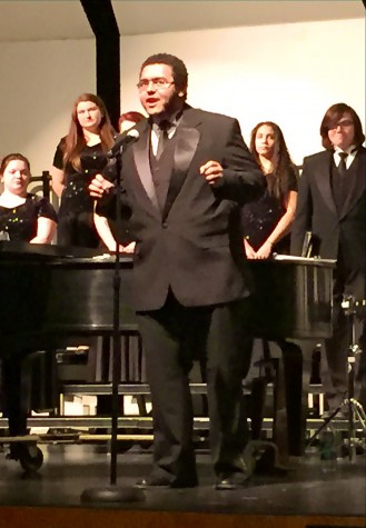 Junior Zack Broughton sings Edward German's "Rolling Down to Rio."