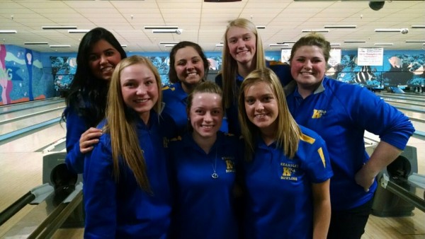 The bowling team poses for its team photo after winning its sixth consecutive Flint Metro League title on Feb. 4. (Back row, l to r) Kayla Emmendorfer, Alexxa Flood, Hannah Ploof, and Dani Doolan. (Front row l to r) Morgan Stephen, Teagan MacDonald, and Haleigh Rybka.