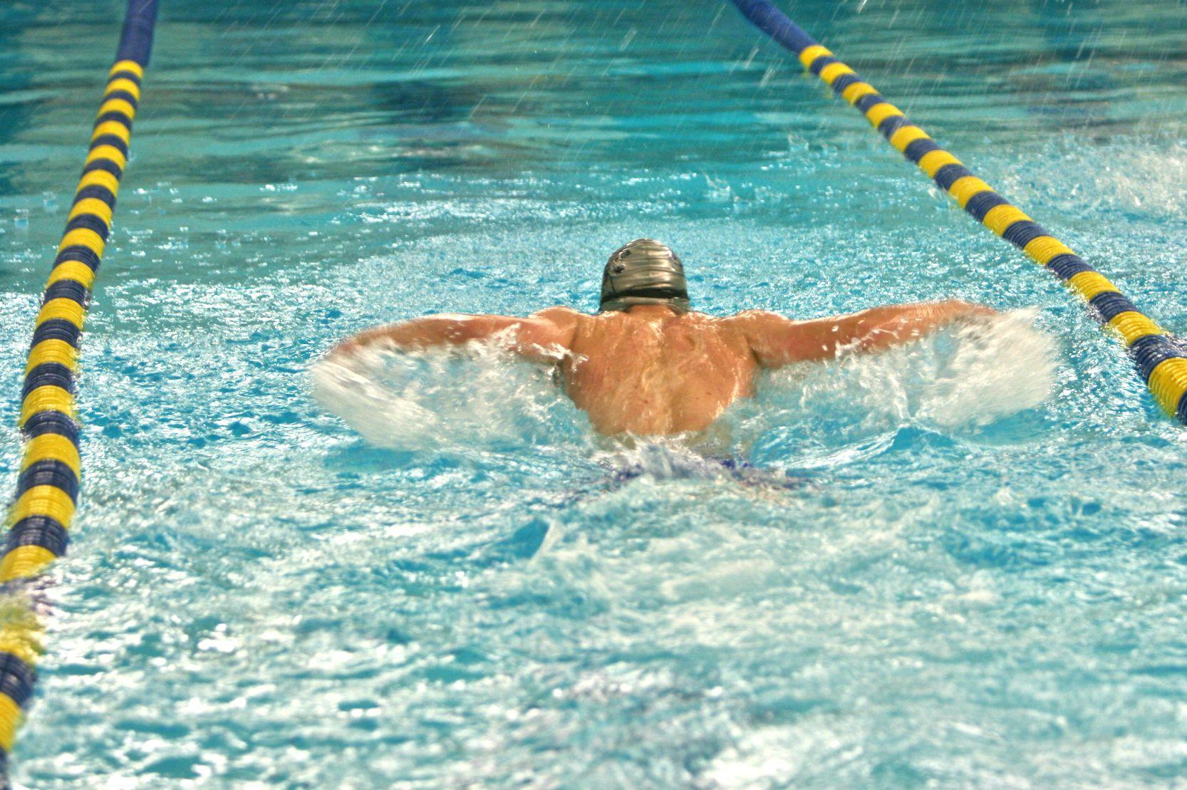 Senior Marco Rivera swims the butterfly portion of the 200 I.M. against Swartz Creek/Flushing on Feb. 3.