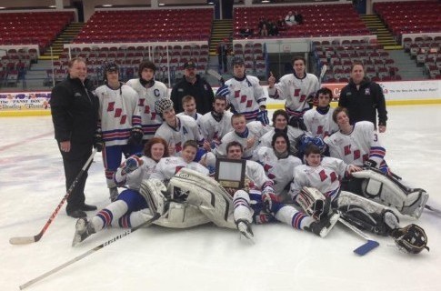 The hockey team celebrates its league championship after beating Flushing 8-0 on Feb. 18.