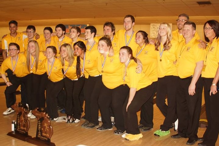 The boys' and girls' bowling teams celebrate their back-to-back Division 2 state titles on March 6.