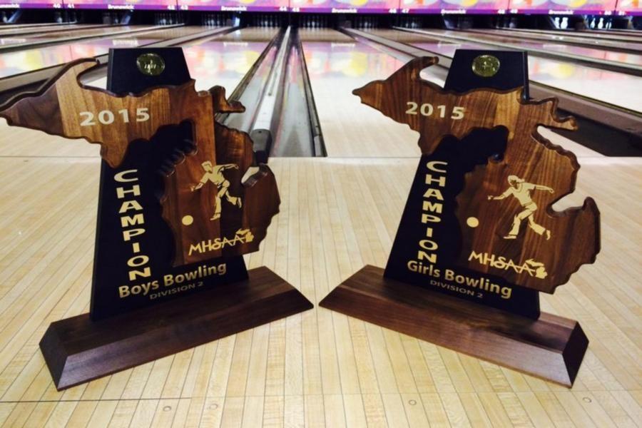 The boys and girls bowling teams 2015 state championship trophies.