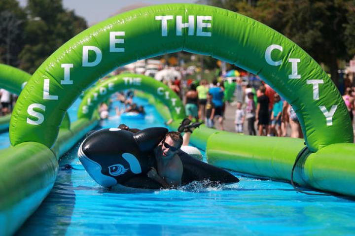 Slide the City is coming to downtown Flint this summer.