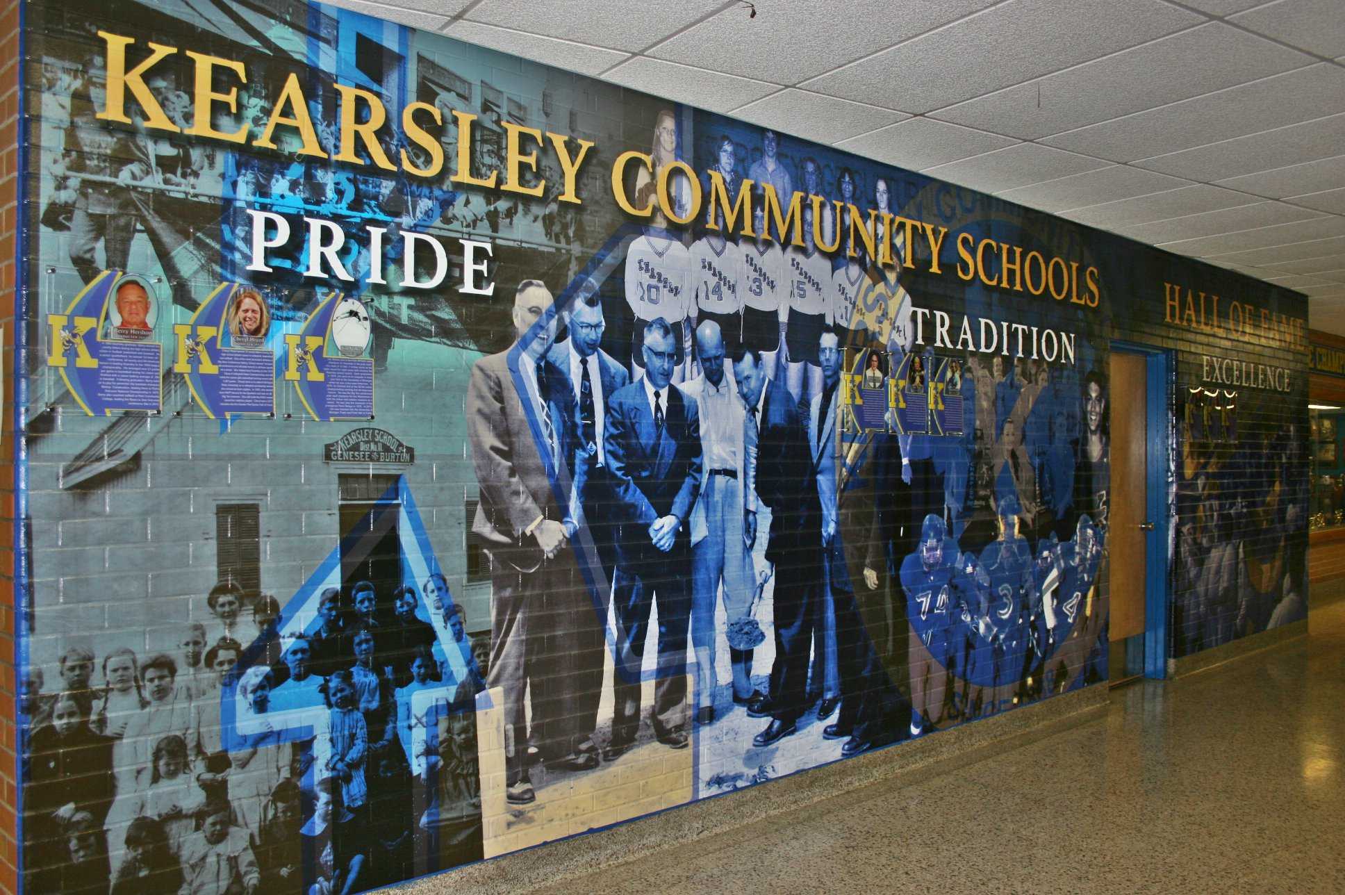 The Hall of Fame mural shows off its three components: pride, tradition, and excellence. This mural was replaced on April 14. The photographer was standing outside the northwest corner of the gym.