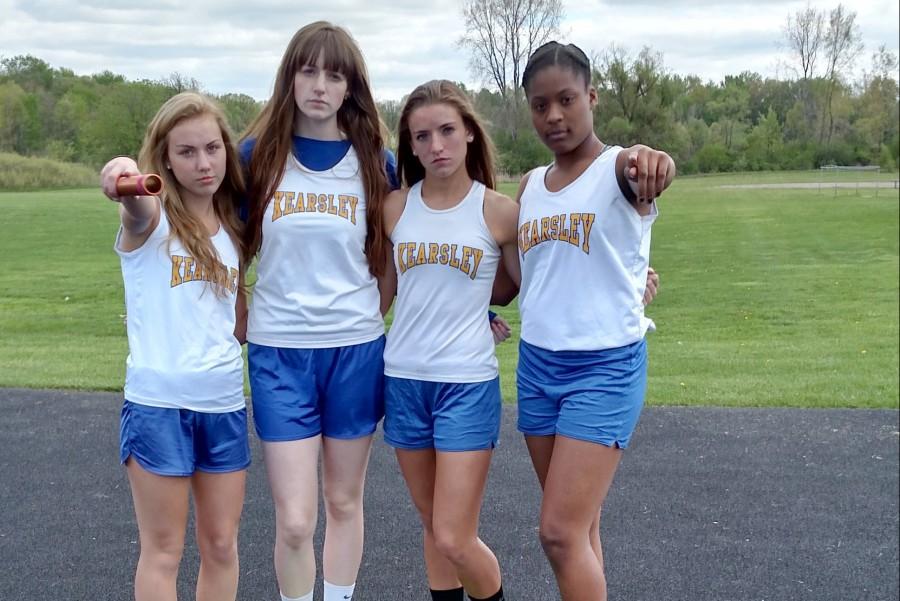 The 1600-meter relay team poses during picture day of the 2015 season. The team is juniors Diane Bond (left), Emalie Lewis, Miranda Lumetta, and sophomore Aver McKay.
