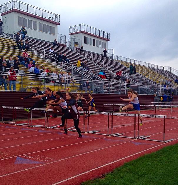 Senior Alicia Konsez hurdles in the 100-meter hurdle semifinal. Konsez finished the event ninth overall in 17.60.