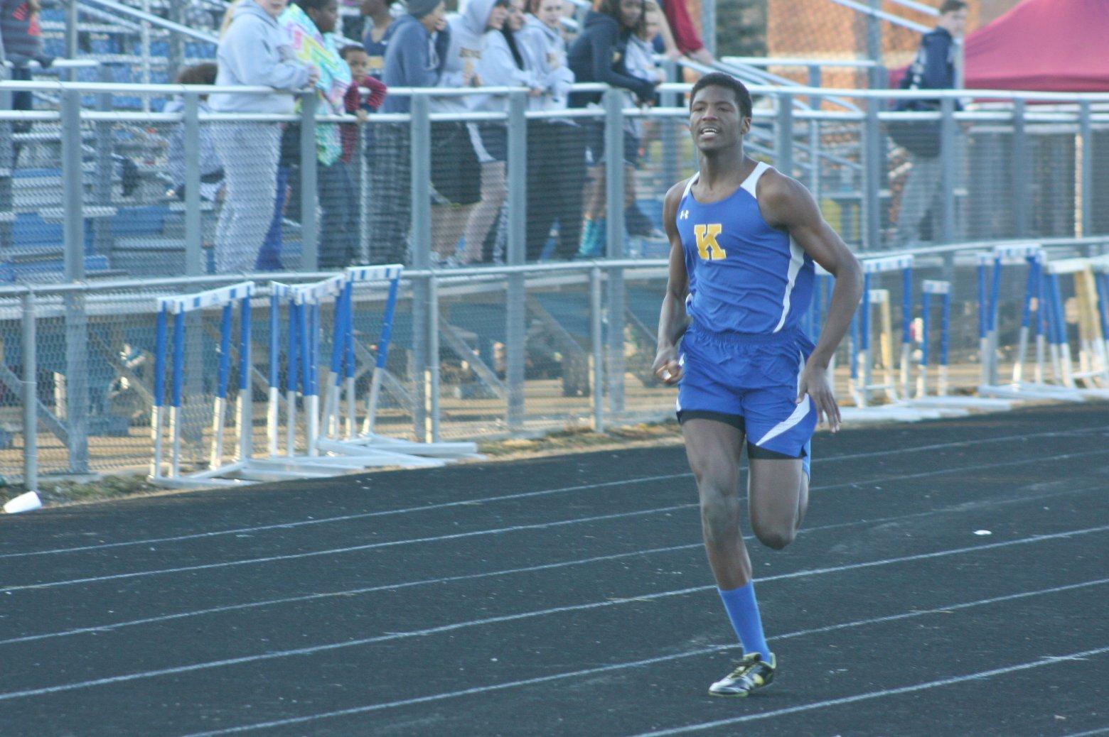 Junior Jonathan McKay runs the 3200-meter relay during the Kearsley Early Bird Relay on April 1. McKay qualified for the state final in the and in the 400 dash.