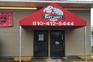 Baby Jake's Pizza uses all fresh ingredients with homemade sauce and dough. You can get a pizza and then head over next door for  ice cream. 