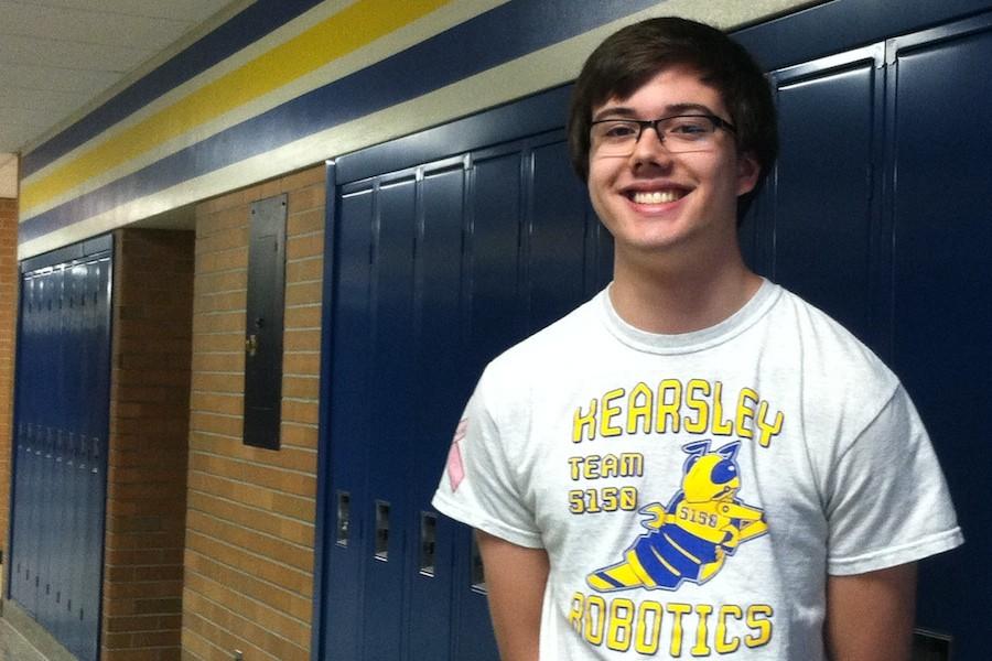 Junior Gabe Carnes wears his robotics shirt to spread the word about Team 5150.