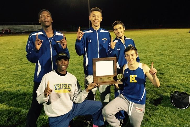 The winning 1600-meter relay team and its alternate pose after defeating Holly in the Metro league championship at Linden on May 20. The team is junior Jonathan McKay (back left), sophomore Darrion Younger, junior Matt Worley, senior Anton Webster (bottom left), and senior Trevor Gehrigh.