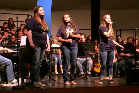 Seniors (left) Kaci Yencer, Courtney Banks, and Sydney Owens perform "Try" by Colbie Callait.