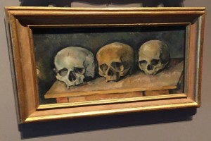 Paul Cézanne's "The Three Skulls" hangs in the Detroit Institute of Art. 