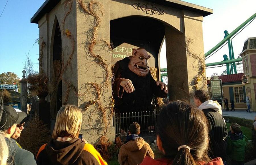 An animatronic monster is displayed near the Raptor roller coaster during HalloWeekeds at Cedar Point. 