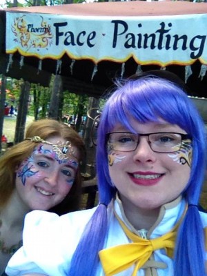 Amy and I stop to take a picture of our face paint. 