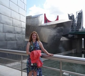 In the middle of touring the museum, I stop to take a picture on one of the balconies. 