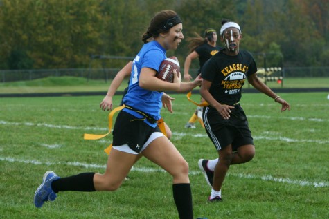 Junior quarterback Chloe Jankowski runs with the ball.