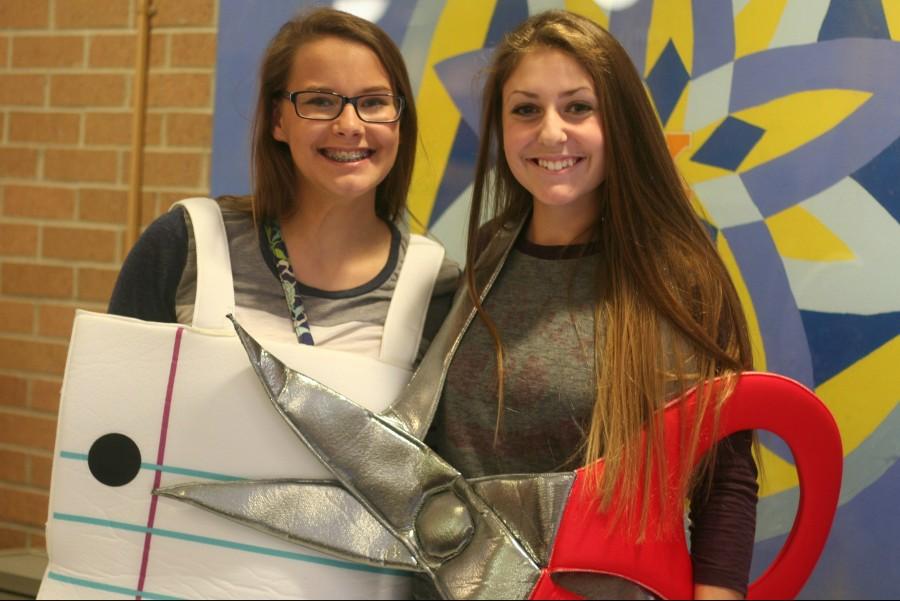 Sophomores Lauren Pariseau (left) and Emily Diehl show off their rock, paper scissors, costume. Missing is the rock -- sophomore Elise Pariseau.