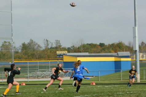 Junior Brittney Dick runs with seniors for the ball.