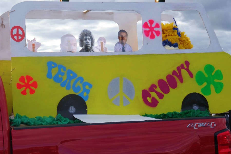 Public figures of the 70s get groovy on the Junior Class float.