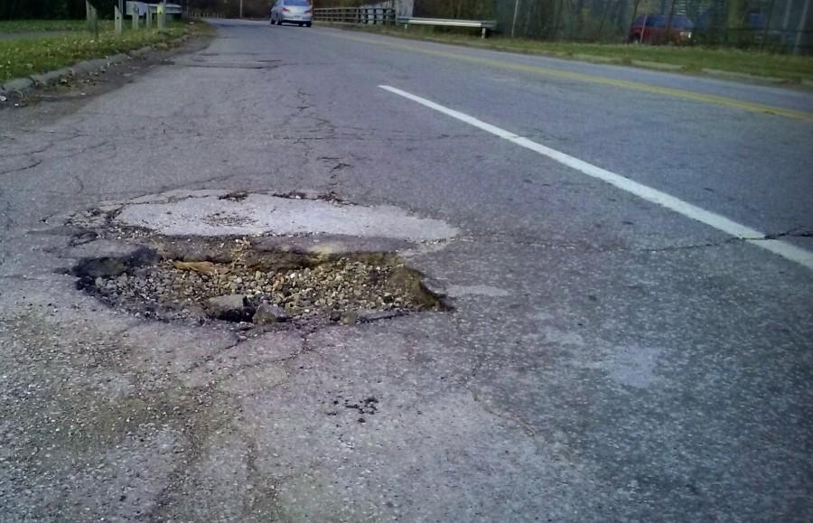 Roads+may+see+a+fix+now+that+Gov.+Rick+Snyder+has+signed+a+road-funding+bill.