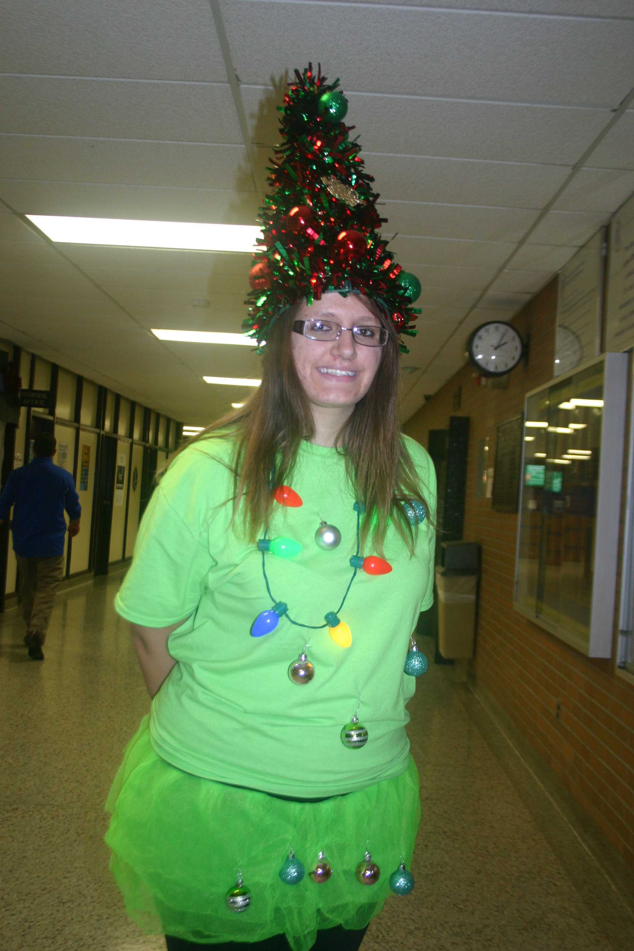 Senior Olivia Broughton dresses like a Christmas tree during spirit week. The string of lights actually light up.