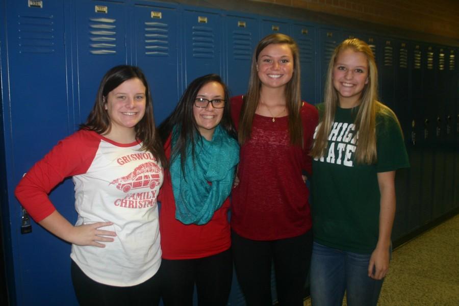 Juniors MadisonTeed, Kaitlyn Alburtus, Brandi Morgan, and Kayla Meyer wear red and green for Christmas spirit week
