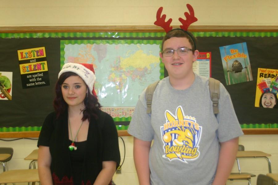 Sophomores Ally Clark (left) and Jake Reid participate in Christmas sock and hat day
