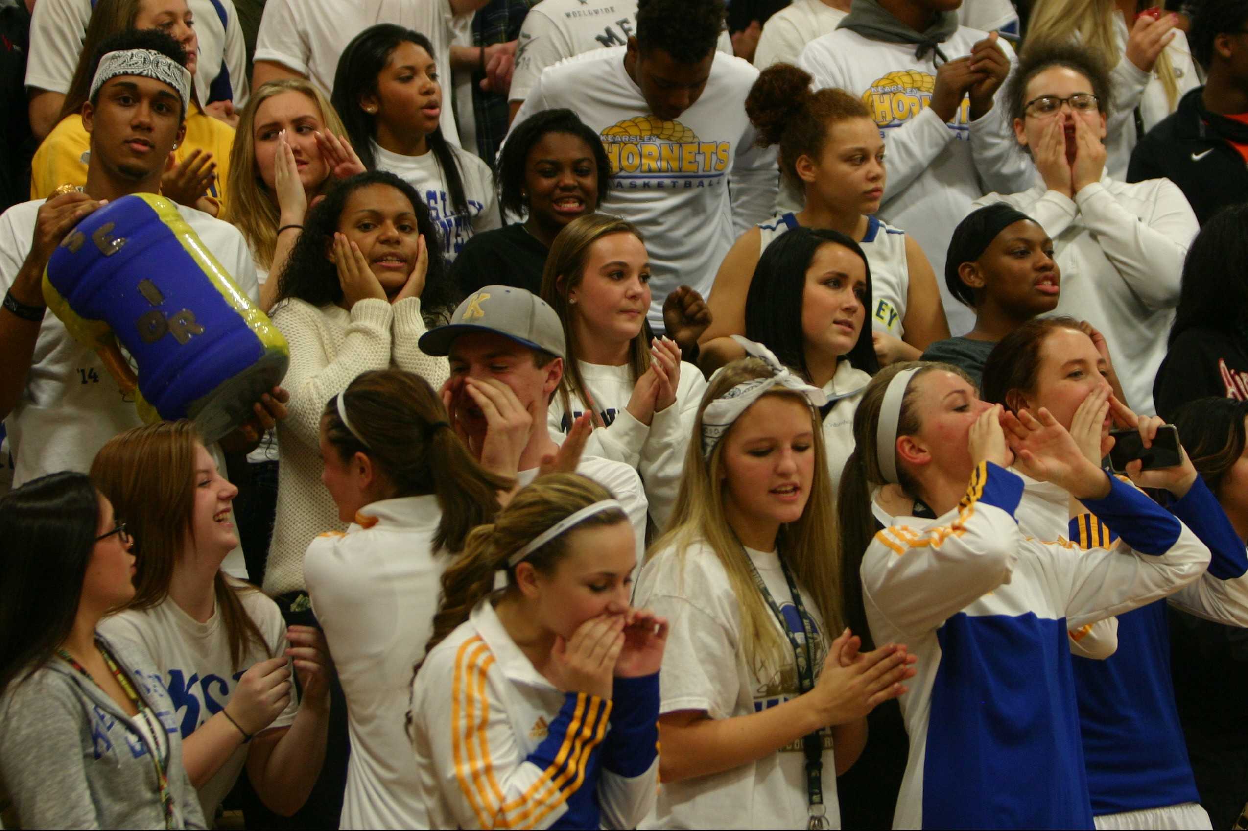 The student section urges their Hornets to play hard during the Swartz Creek game on Friday, Dec. 11.