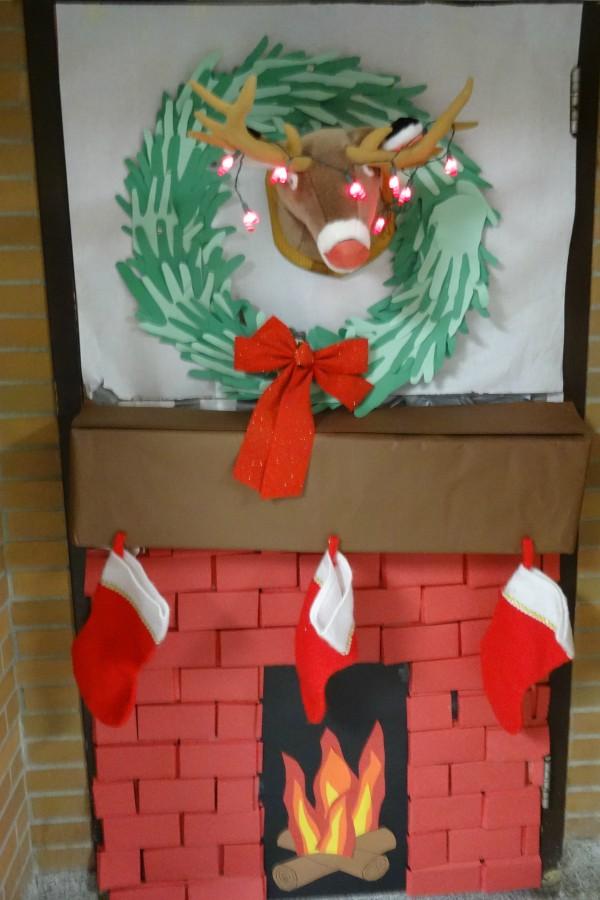 Mrs. Amy Graham has Rudolph on her door's mantle.