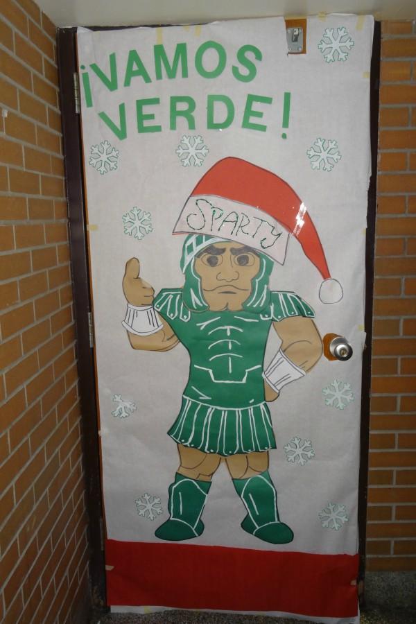 Ms. Caitlyn Hudgins' door reads "Vamos Verde" which translates to "We are green."