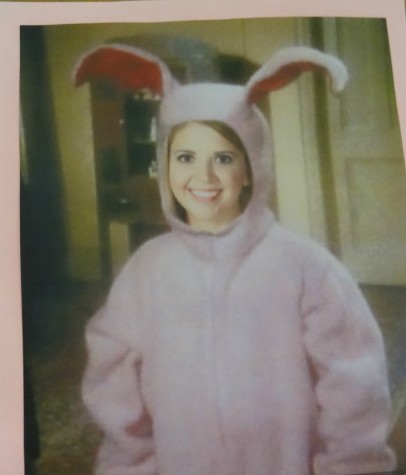 Ms. Laura Pence dresses up in a pink bunny costume.