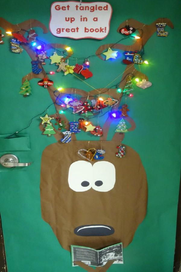 Ms. Kari Shaw aims to encourage reading during the holiday season with her door.