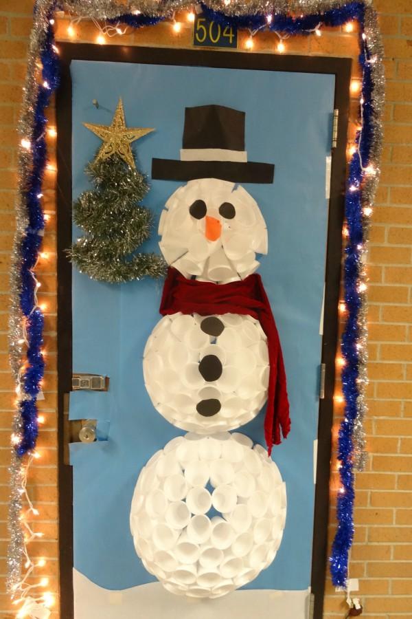 Ms. Tompkins'; door features a snowman.