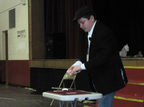 Freshman Tyler Gronauer prepares to perform at "Magicfest" in Colon michigan on Tues. April 1, 2014