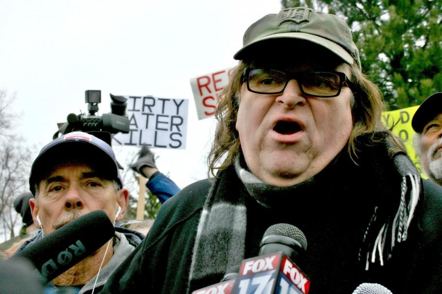 Mr. Michael Moore speaks at a press conference outside Flint City Hall on Saturday, Jan. 16.