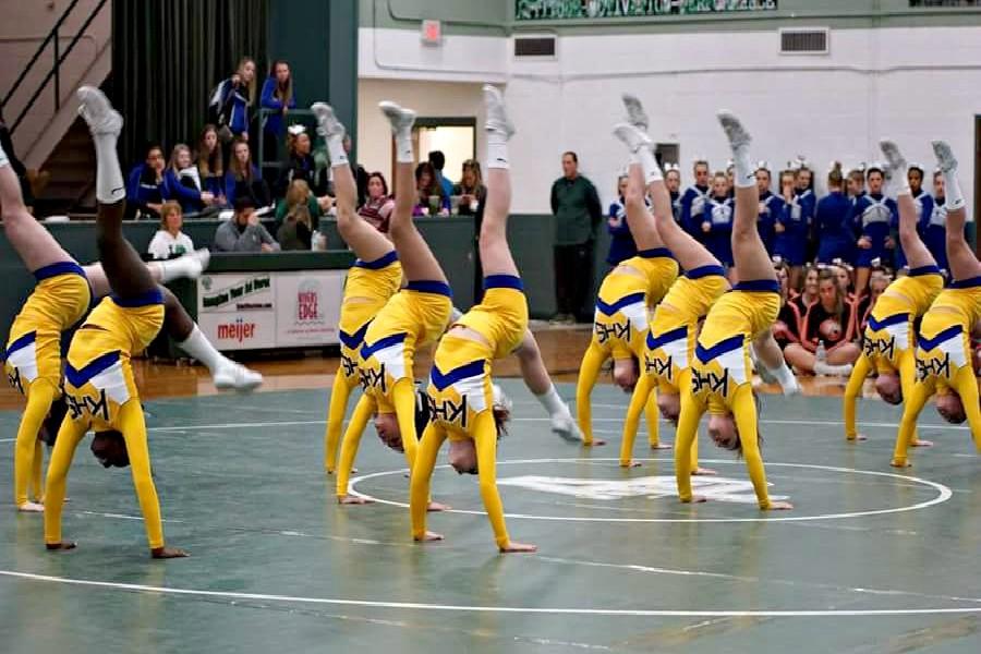 The Hornets perform back-walkovers during round two at the regional competition on Saturday, Feb. 27, hosted by Allen Park. 