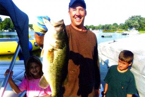 Nester enjoys fishing with his children.