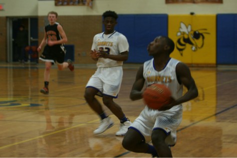 Sophomore Taveon Harris driving toward the hoop in the second quarter