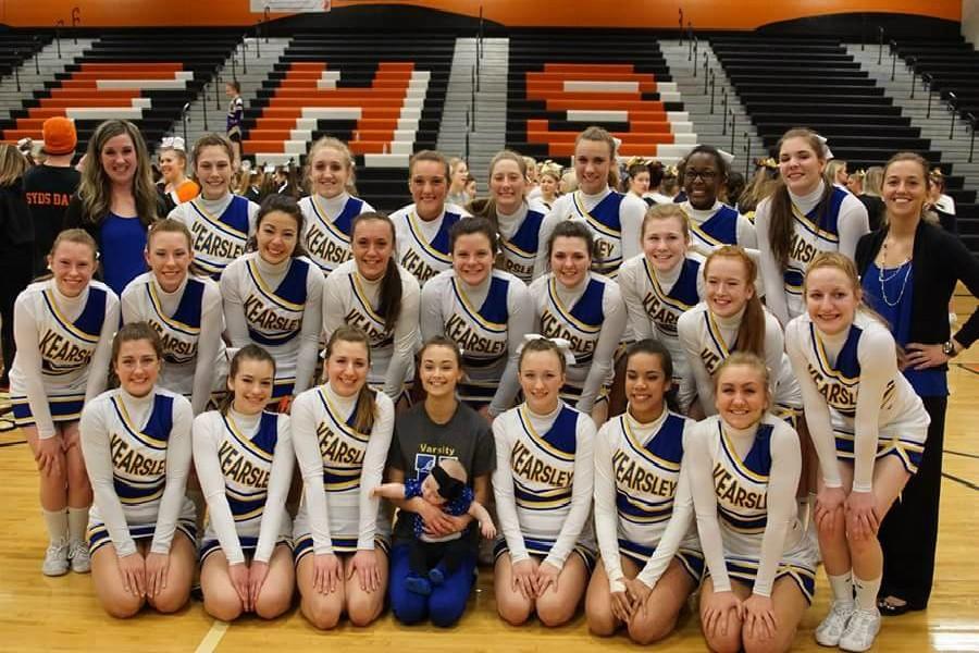 The+cheer+team+poses+for+a+photo+at+the+district+competition+hosted+by+Fenton+on+Saturday%2C+Feb.+20.+