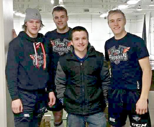Senior Kyle Ross (second to right) pictured with Firebirds players Jacob Collins (left), Alex Peters, and Hakon Nilson.