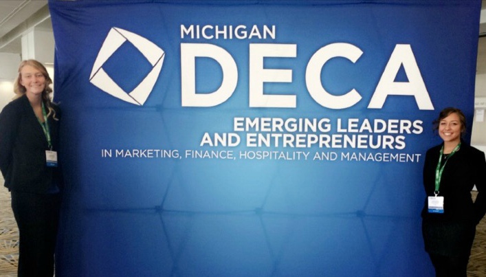 Seniors Hannah Ploof (left) and Nadia Koontz enjoy being at the Michigan DECA conference Friday and Saturday, March 11 and 12.