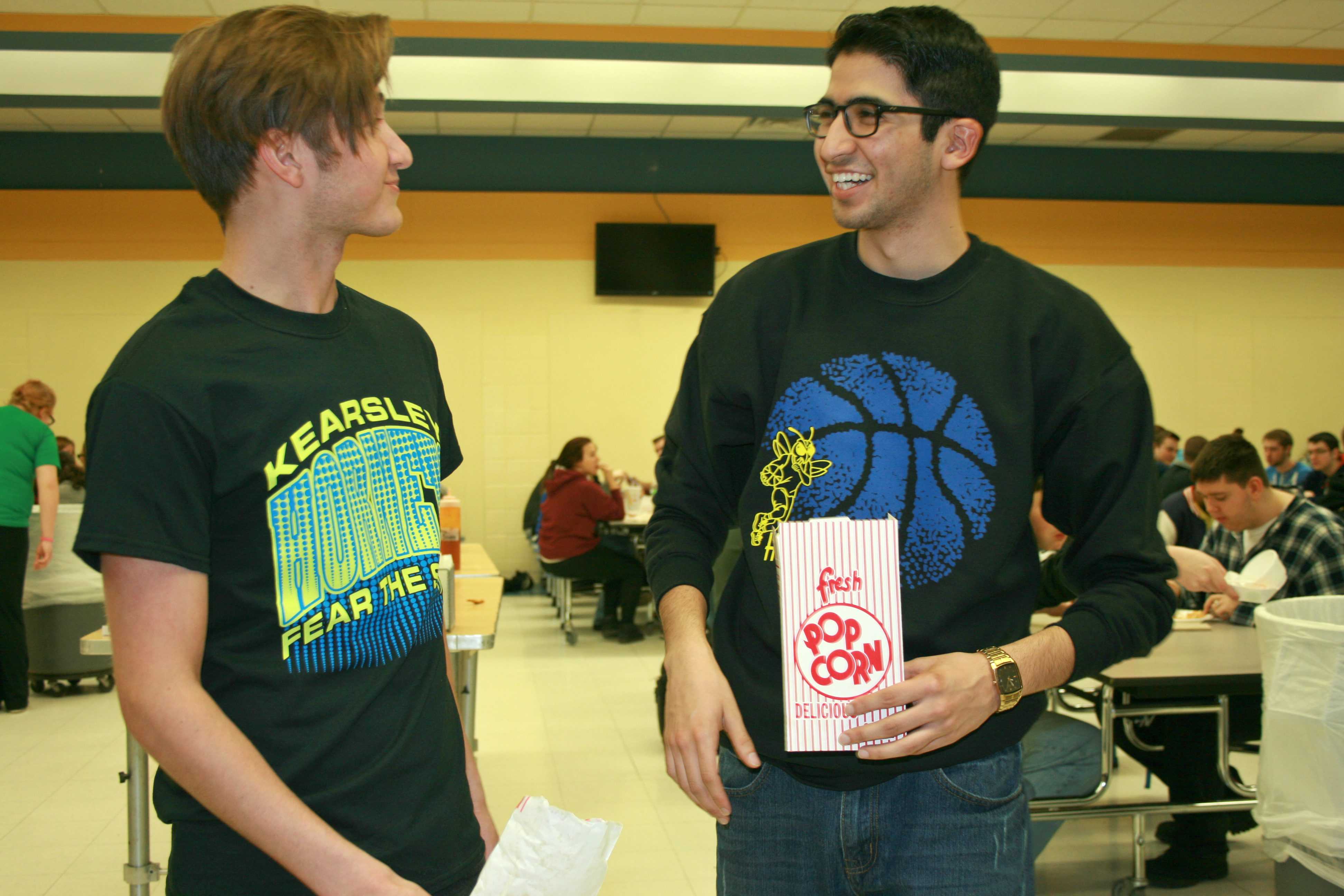 Seniors Andrew Edwards (left) and Santino Guerra sport different K-Town Tees designs on their T-shirts.