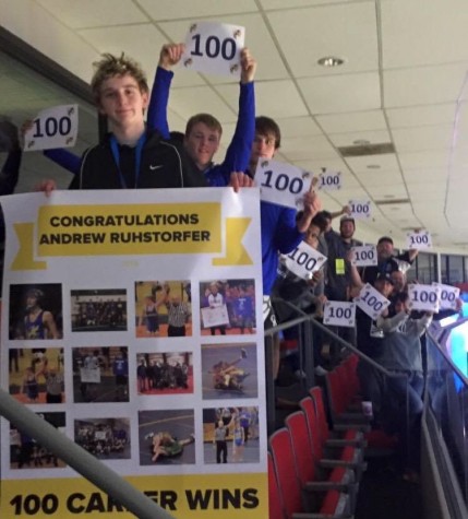 Sophomore Andy Ruhstorfer achieved 100 career wins and his teammates celebrated with him.