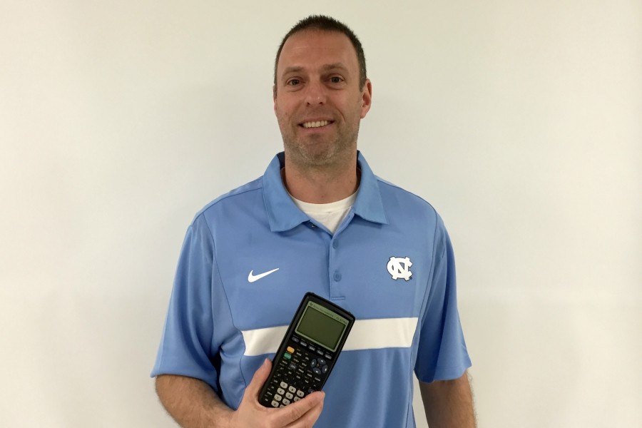 Mr. Chris Torok wears his Tar Heel colors with pride since he will become the educational director for the mens basketball team at North Carolina. This was announced on April 1.