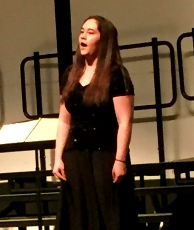 Leslie Brissette, senior, beautifully sings "Oh, What A Beautiful City."