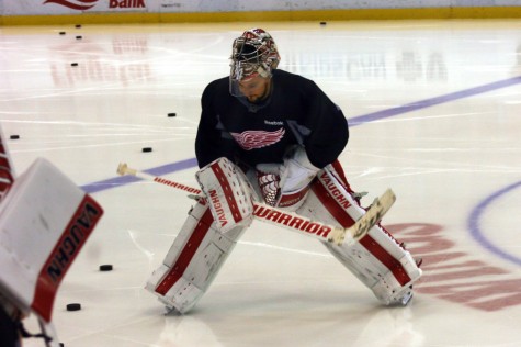 A goalie for the Red Wings prepares to practice.